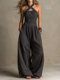 Leyre | Mono con elegante escote cruzado.